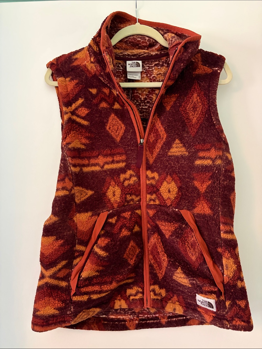 North Face Women’s Red & Orange Patterned Sherpa Fleece Vest, Size M